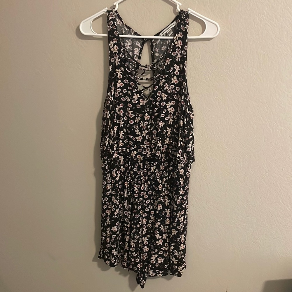 Small Black Floral pattern open back American Eagle Romper